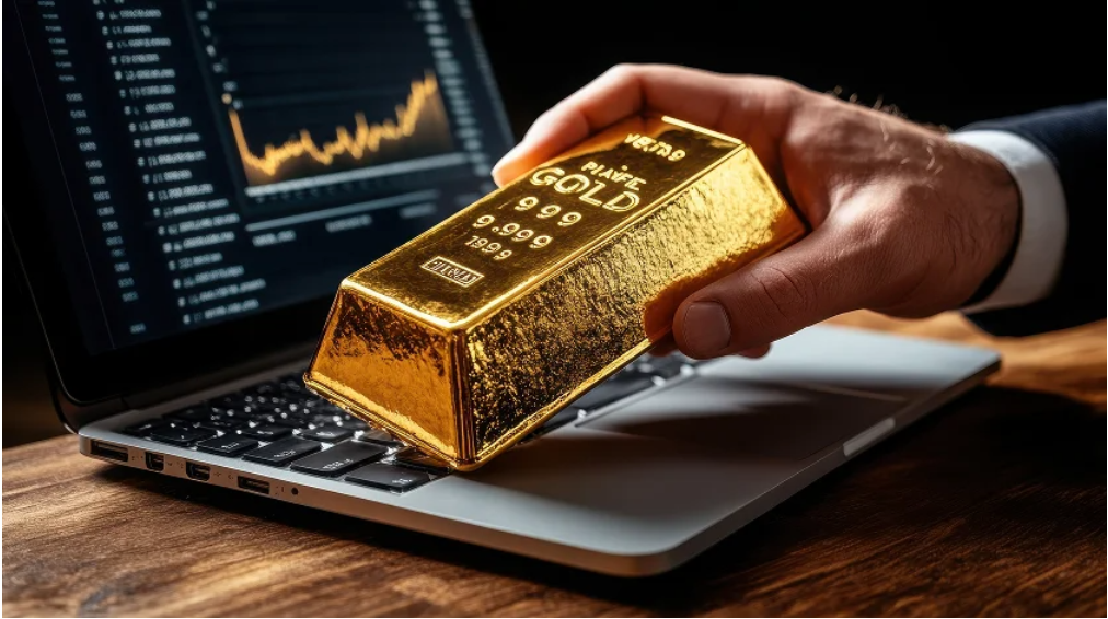 Gold bar on laptop with rising market chart symbolizing investment and trading trends